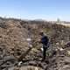 Ethiopian Airlines CEO Tewolde Gebremariam is seen at the flight ET 302 crash site near the town of Bishoftu, Ethiopia March 10, 2019 in this picture obtained from social media.